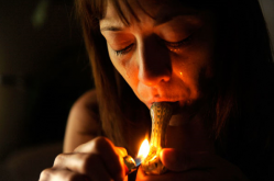 During a very bad morning of steady pain and nausea Deana Martinez uses a small pipe hoping for quick relief after hours of struggle. The lack of sleep, pain and frustration brings her world crashing down around her. "If it hadn't been for the medical marijuana I would not have made it through the last year." she said. (Joe Amon)
